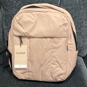 Brand new with tags Calpak Luka laptop backpack in rose quartz.